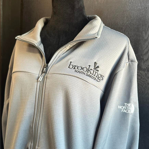 Embroidered Brookings South Dakota Logo on a North Face Jacket by Cotton & Customs LLC.