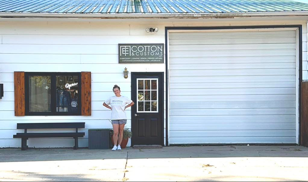 Erika standing in front of the Cotton & Customs Studio