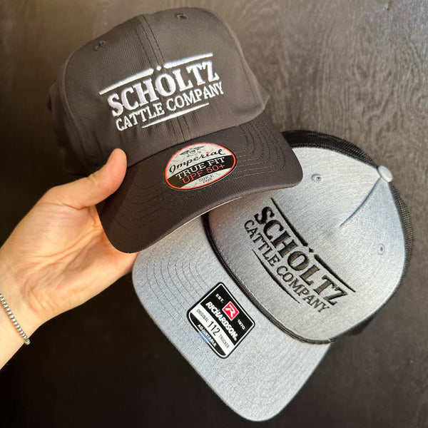 Custom hat with stitched cattle business logo created in Volga SD